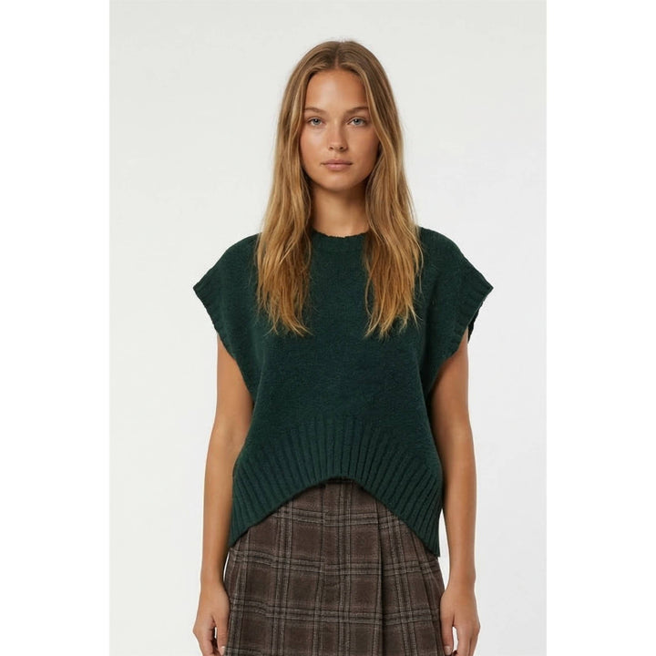 Sweater vest with shark bite hem
