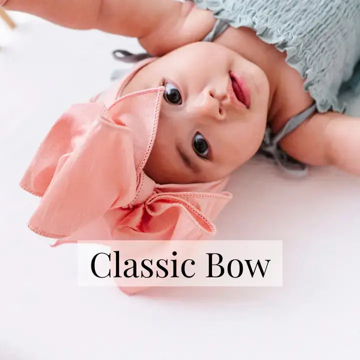Accessories - Baby Bling® Faux Silk Big Classic Bow on soft nylon headband - - Cultured Cloths Apparel