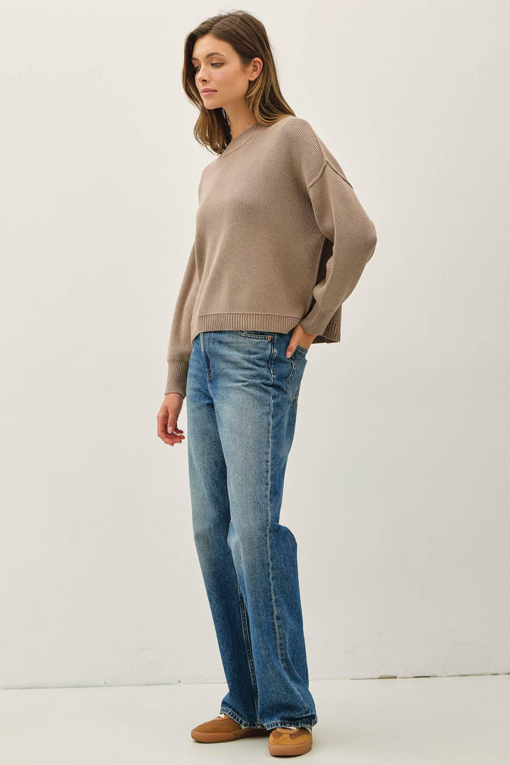 RIBBED KNIT SWEATER WITH RAW SEAM DETAILS