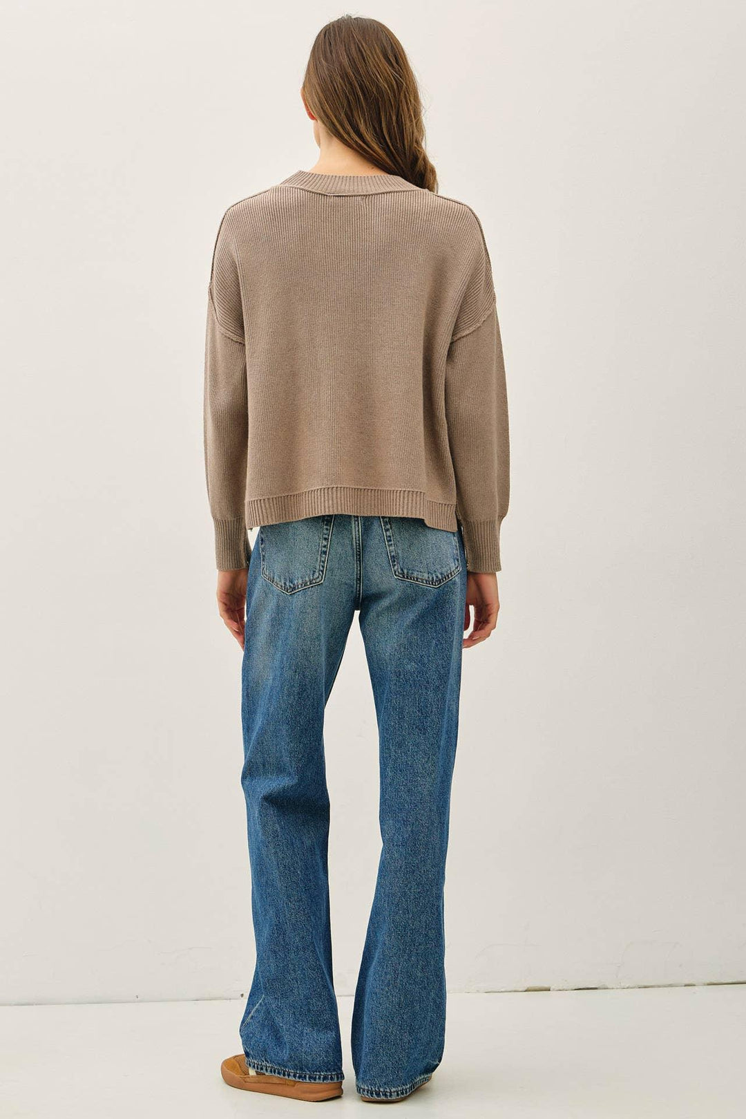 RIBBED KNIT SWEATER WITH RAW SEAM DETAILS