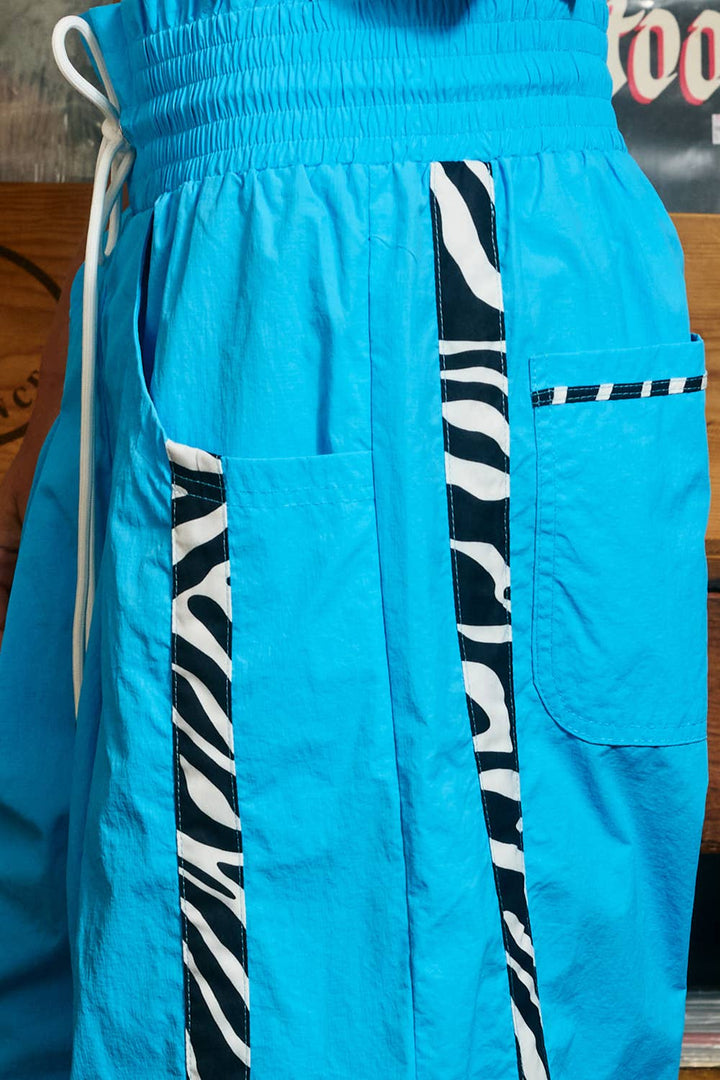 IP5540-ZEBRA | Zebra Side-Striped Wide-Leg Windbreaker Pants