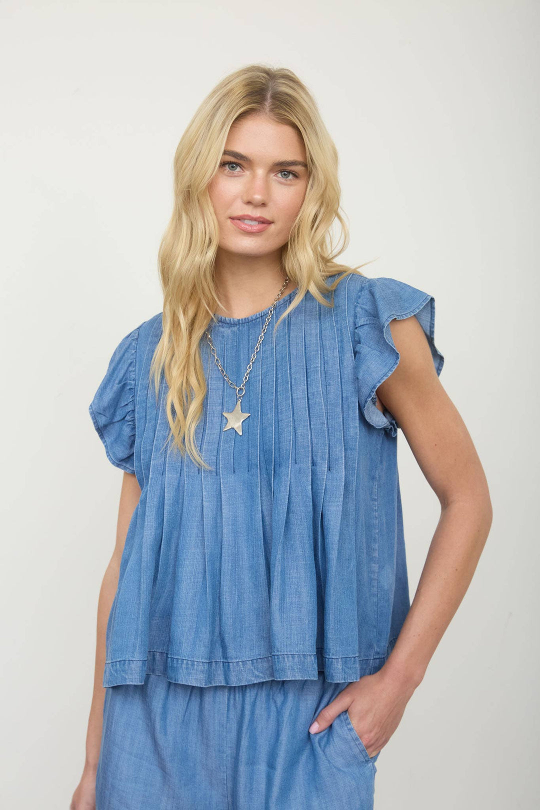PINTUCK DETAIL RUFFLE SLEEVE DENIM TOP