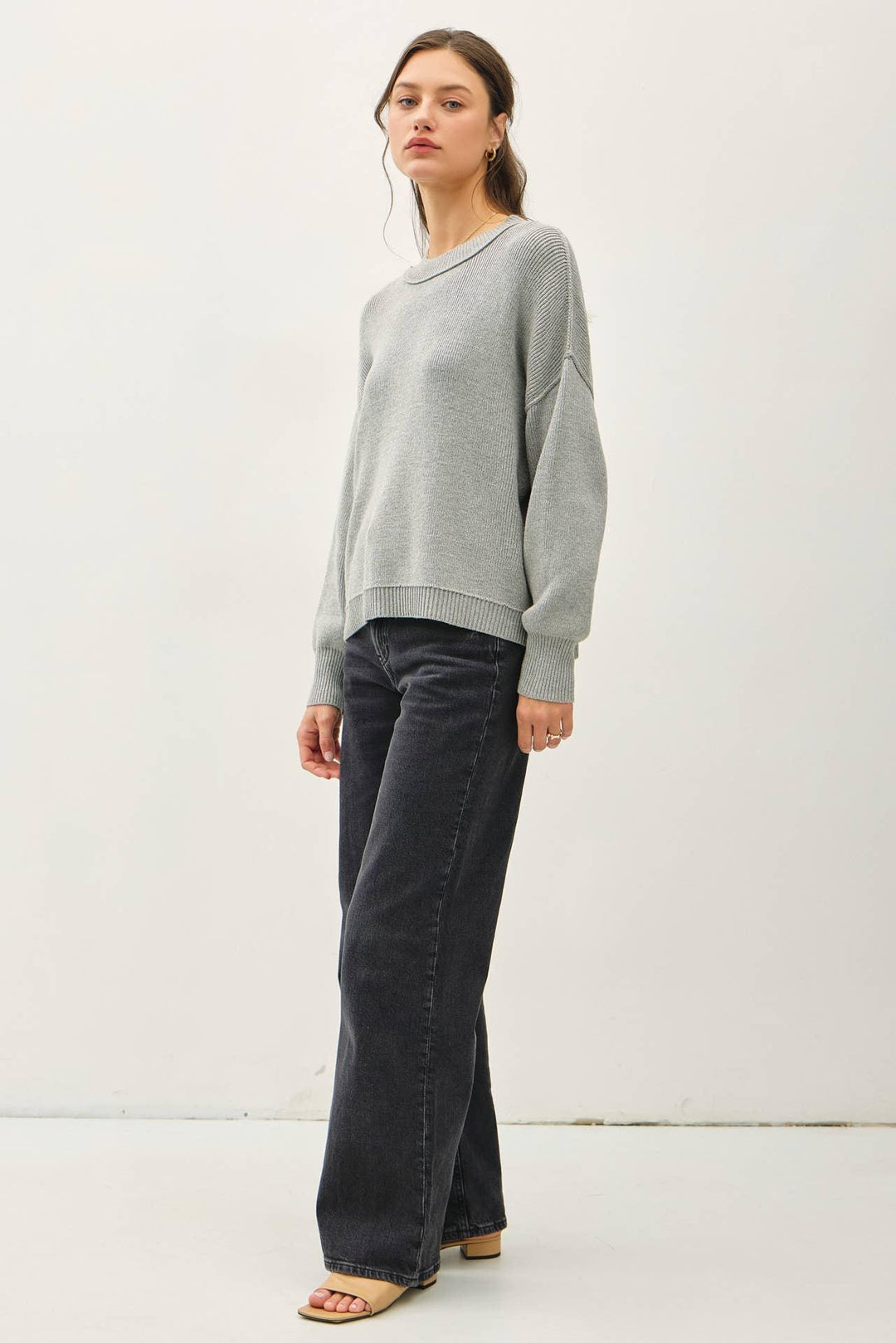 RIBBED KNIT SWEATER WITH RAW SEAM DETAILS