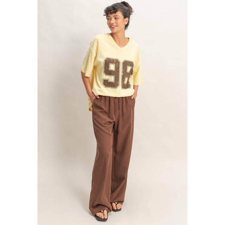 Graphic T-Shirts - Oversized Varsity Style V-Neck Graphic T-Shirt - - Cultured Cloths Apparel