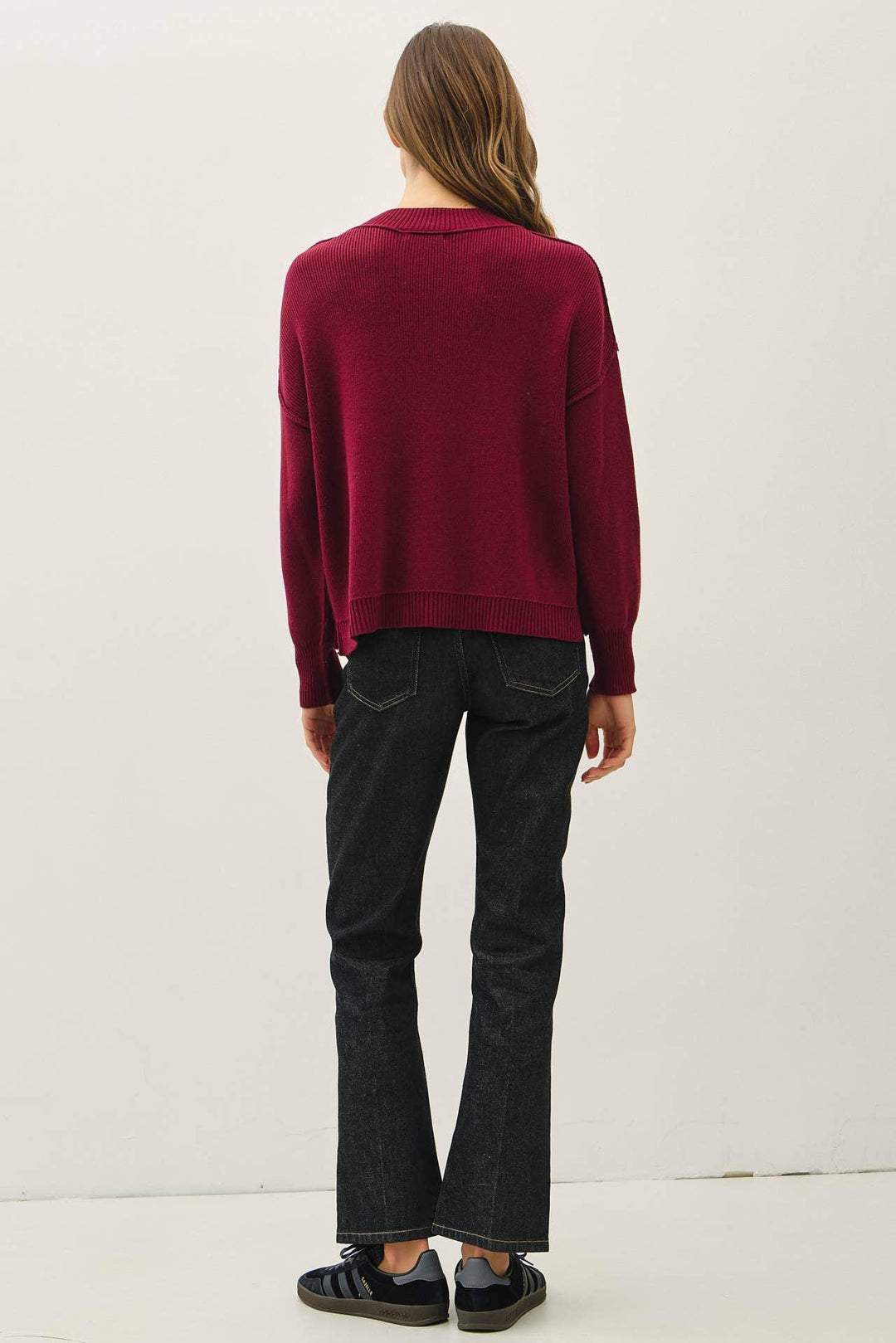 RIBBED KNIT SWEATER WITH RAW SEAM DETAILS