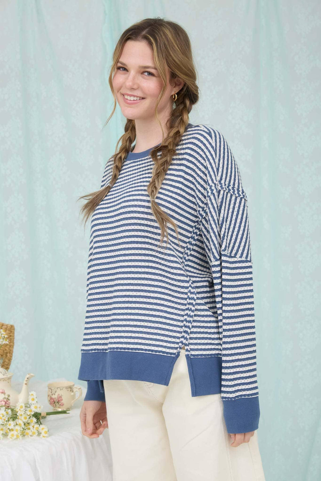 STRIPE EXPOSED SEAM SPLIT HEM LONG SLEEVE KNIT TOP
