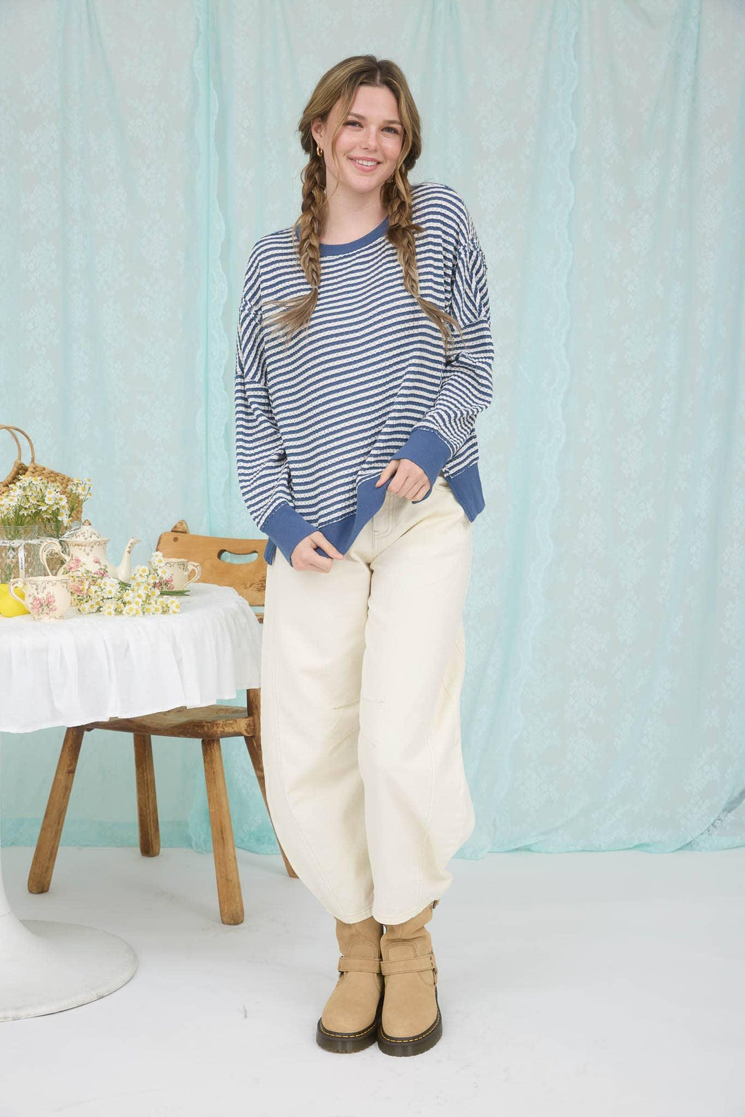 STRIPE EXPOSED SEAM SPLIT HEM LONG SLEEVE KNIT TOP