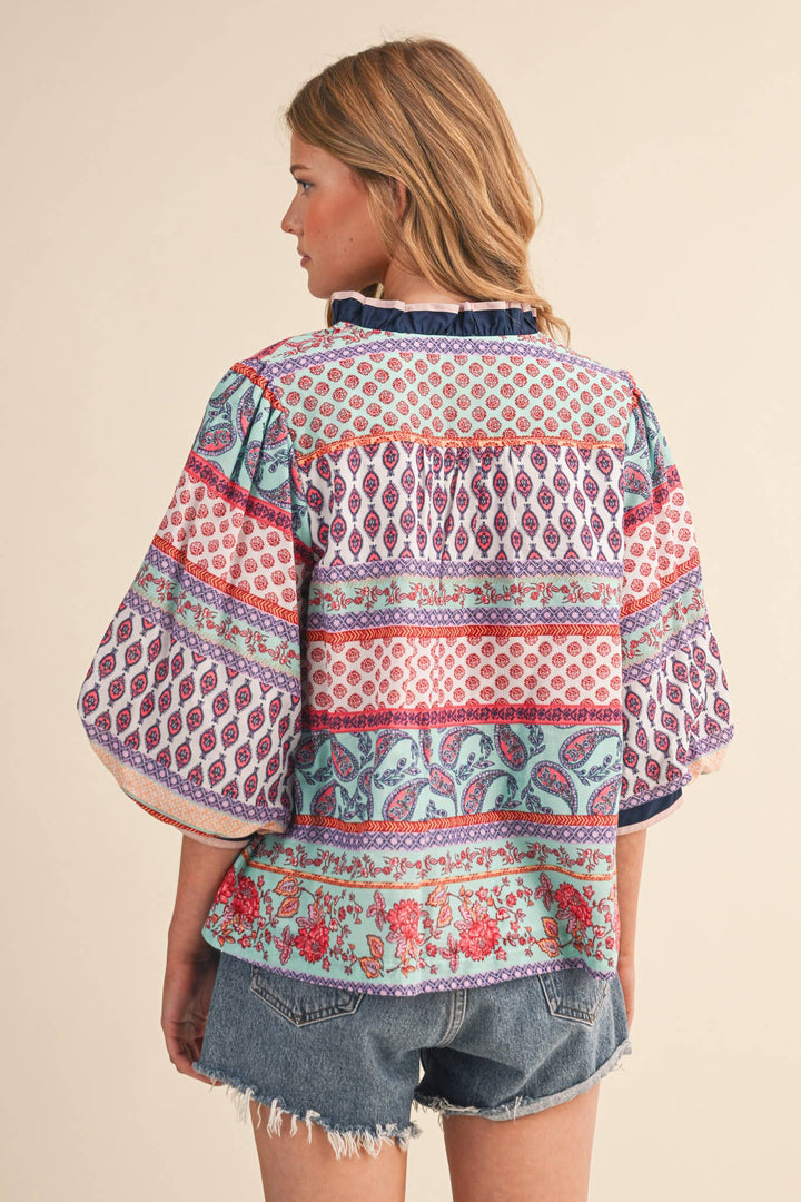 BUBBLE SLEEVE V NECK TOP