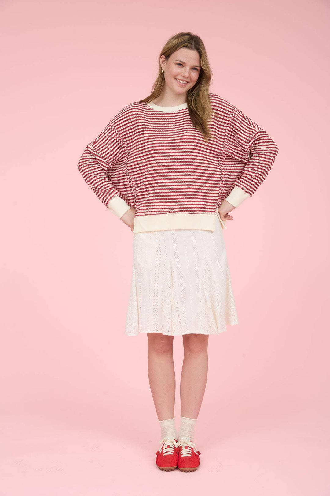 STRIPE EXPOSED SEAM SPLIT HEM LONG SLEEVE KNIT TOP